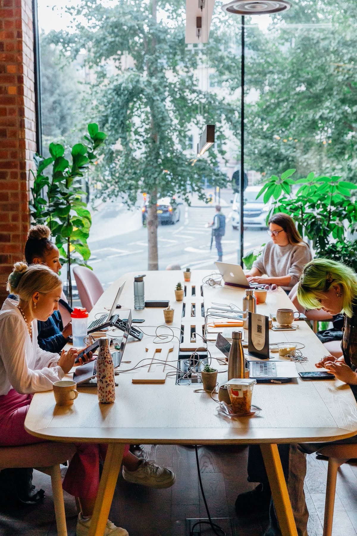 People working together in a bright co-working space