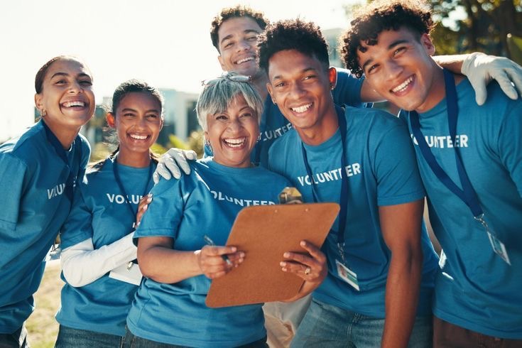 Smiling volunteers in a team
